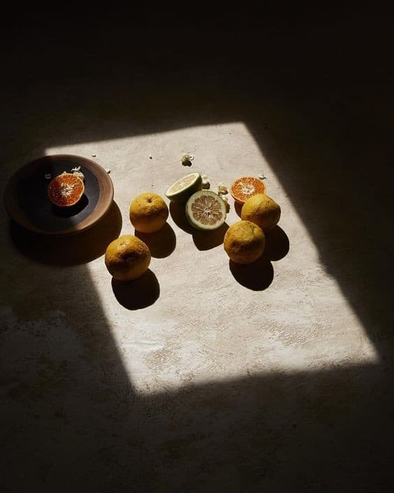 Citrus fruit arranged in warm sunlight